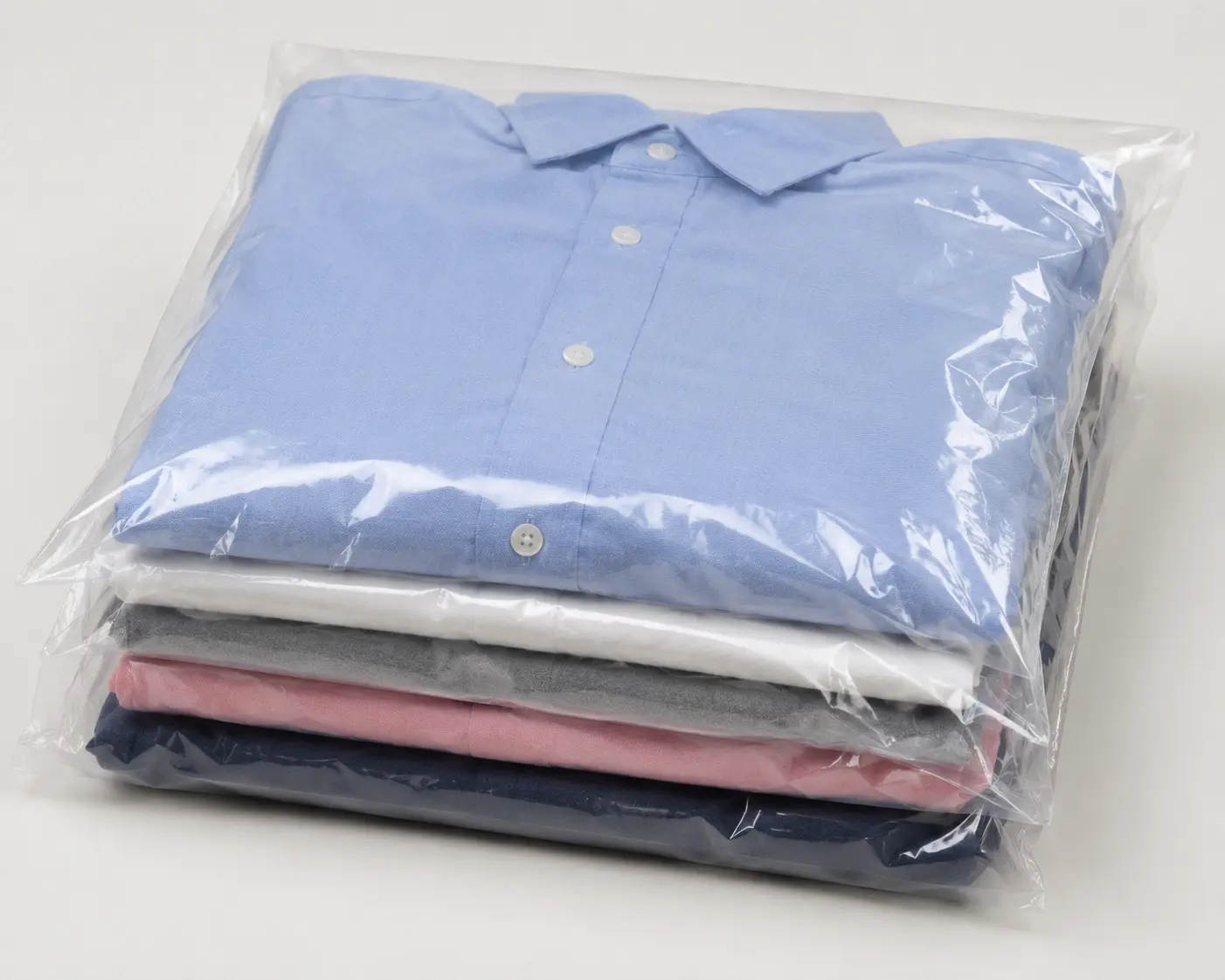 Folded garments packed in transparent LDPE garment packaging bag